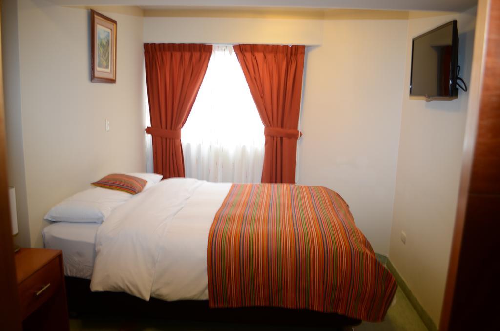 Hotel Cholcana Lima Quarto foto