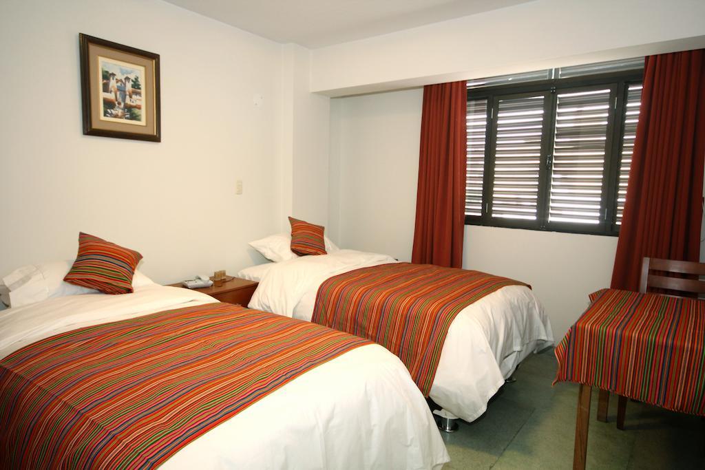 Hotel Cholcana Lima Quarto foto